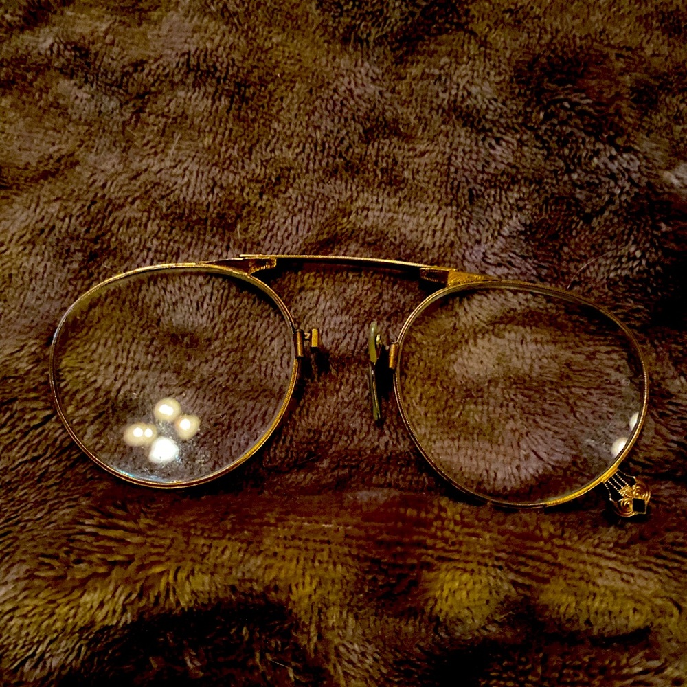 9k gold vintage folding glasses that are from 1880